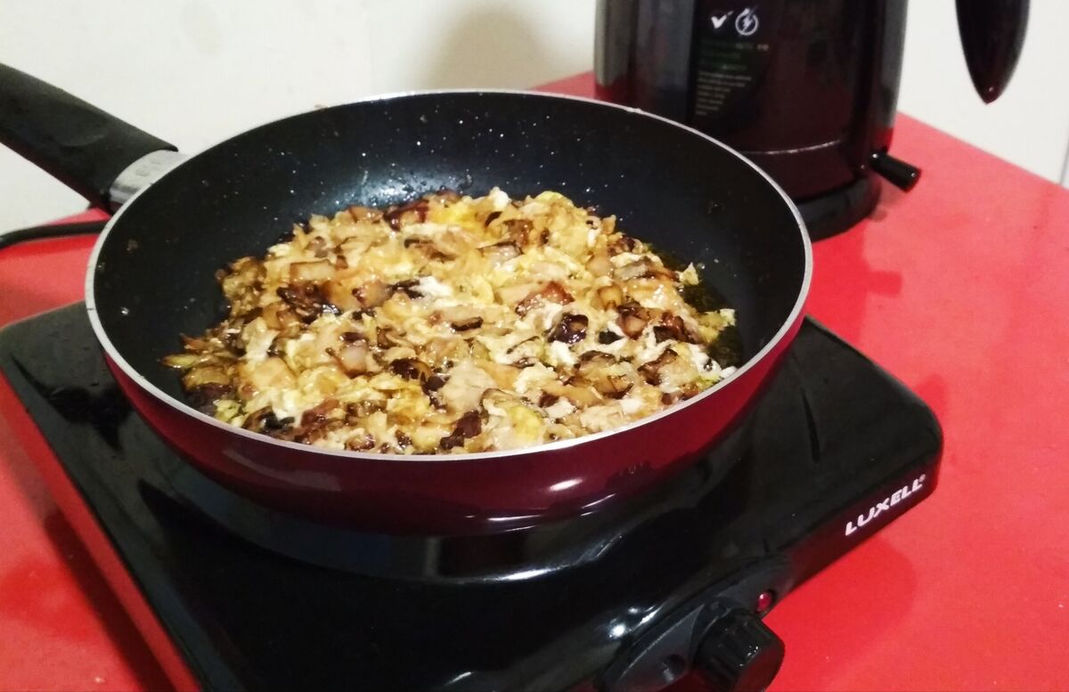 Egg added to tuna and onions